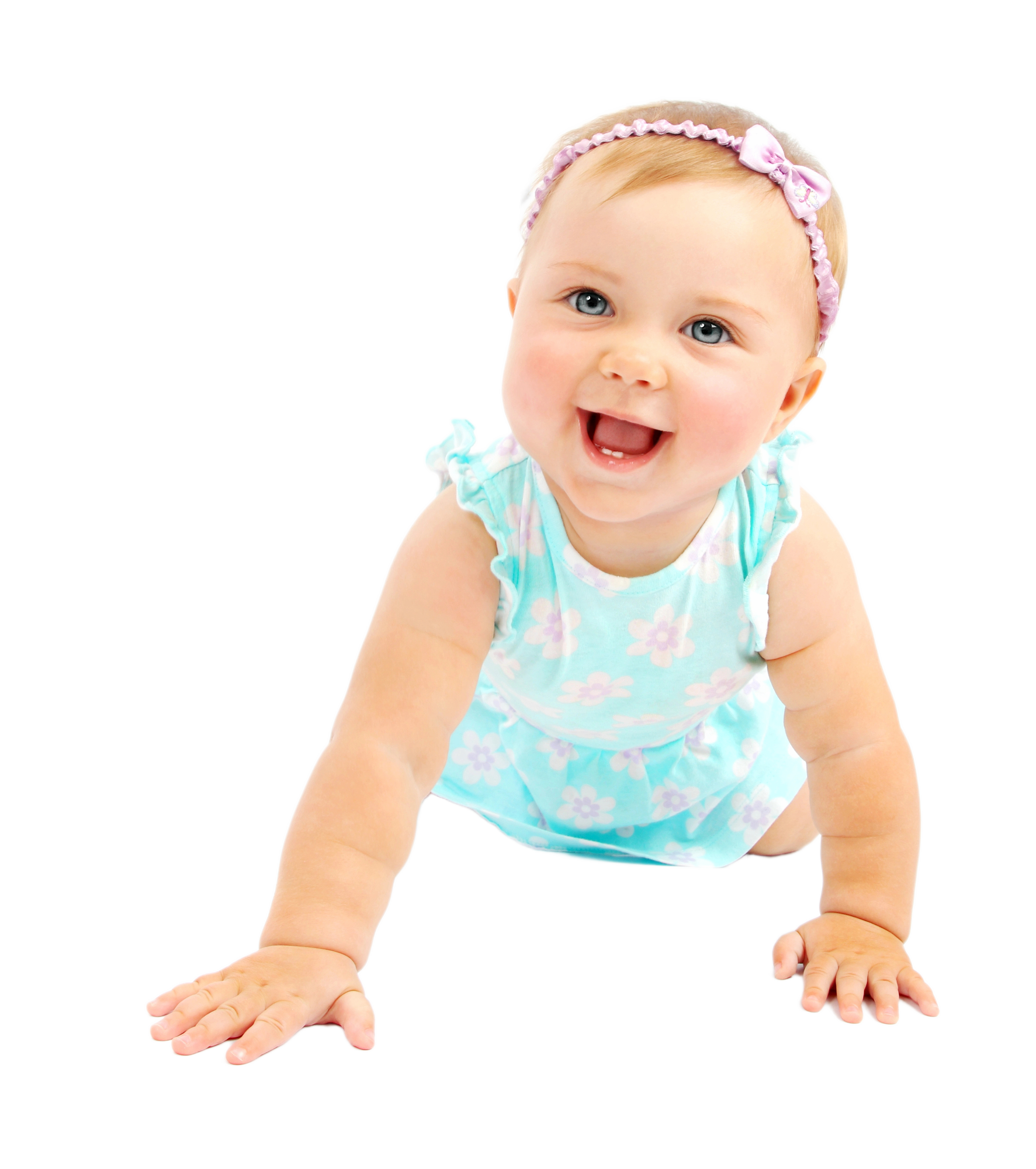 A smiling baby wearing a headband and a blue outfit, crawling against a black background.